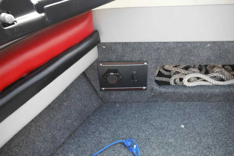 Slide: The Image of Interior of 1993 Sea Nymph SS175 Fish-n-ski boat with ropes and control panel. - 13