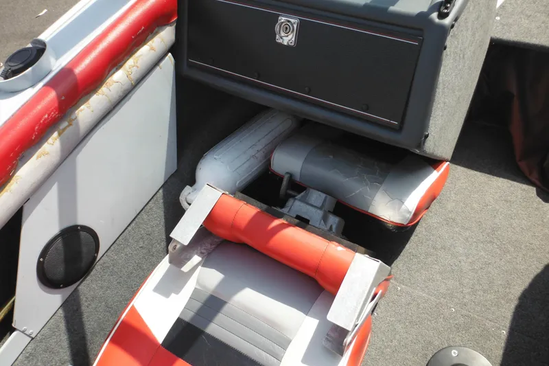 Slide: The Image of Interior of a 1993 Sea Nymph SS175 Fish-n-ski boat with red and gray seating. - 18