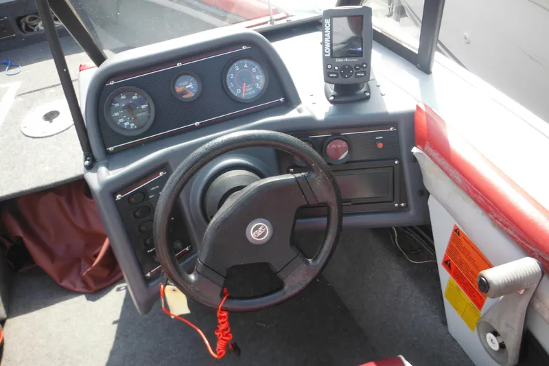 Slide: The Image of 1993 Sea Nymph SS175 Fish-n-ski boat dashboard with steering wheel and gauges. - 19