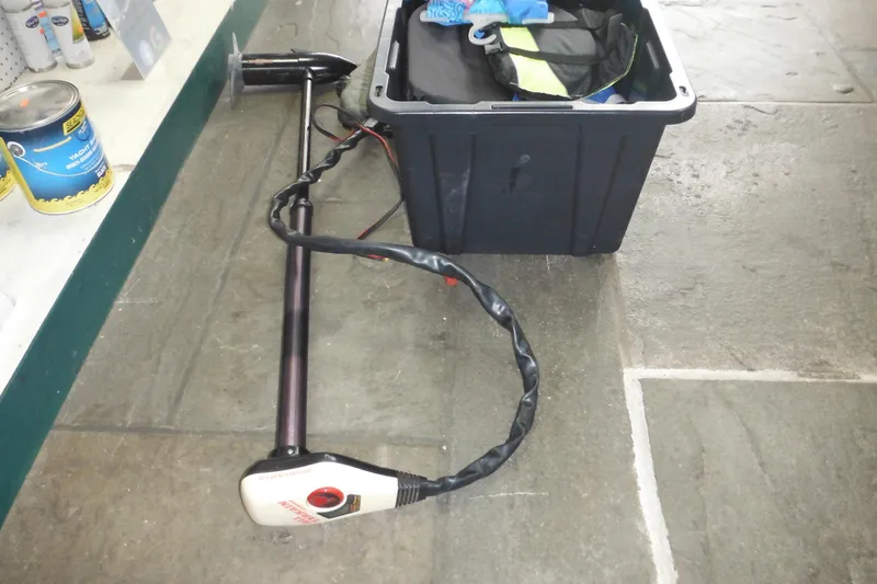 Slide: The Image of Trolling motor and storage box on stone floor, Sea Nymph SS175 Fish-n-ski, 1993 model. - 32