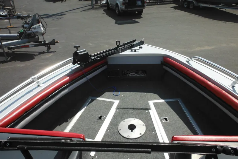 Slide: The Image of 1993 Sea Nymph SS175 Fish-n-ski boat interior with red trim and fishing equipment. - 7