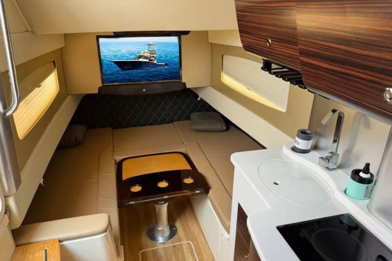 Slide: The Image of Luxurious interior of 2016 Scout 420 LXF yacht with modern amenities and elegant design. - 56