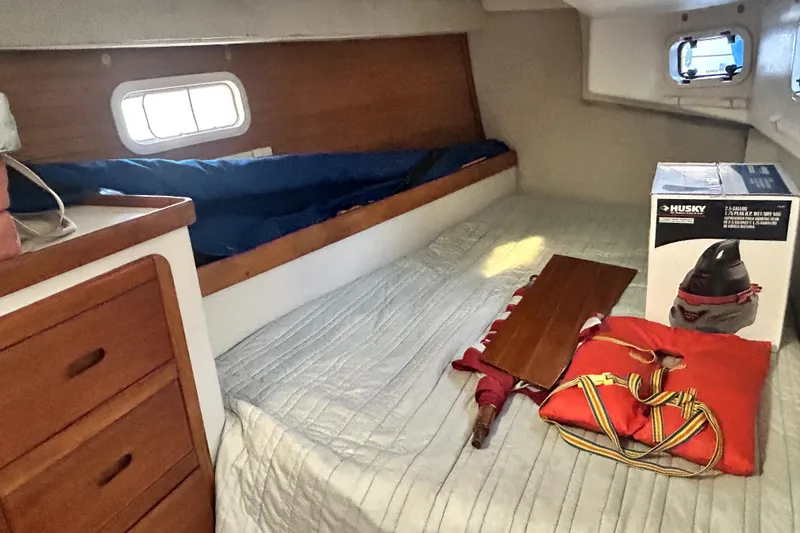 Slide: The Image of Cozy cabin interior of 1991 Catalina 42 MkII sailboat with bed and storage. - 7