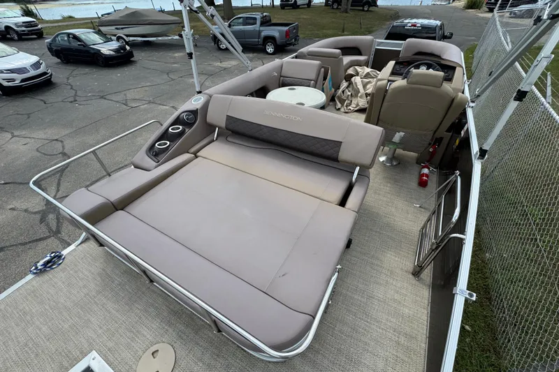 Slide: The Image of 2018 Bennington 23 SSBXP pontoon boat with spacious seating and modern interior design. - 6