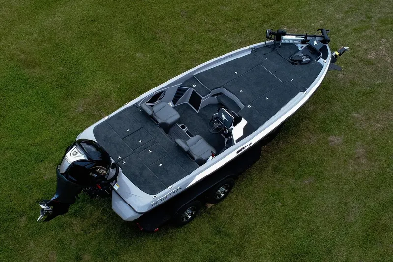 Slide: The Image of 2026 Skeeter ZXR20 SE boat on grass, aerial view, showcasing sleek design and spacious deck. - 2