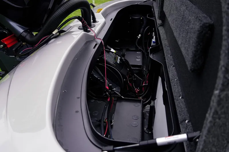 Slide: The Image of 2026 Skeeter ZXR20 SE boat battery compartment with wiring and components. - 20