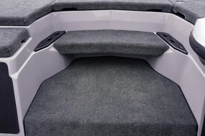 Slide: The Image of Interior of 2026 Skeeter ZXR20 SE boat with carpeted flooring and seating. - 27