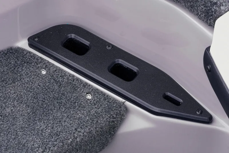 Slide: The Image of 2026 Skeeter ZXR20 SE boat interior with carpeted flooring and black mounting bracket. - 40