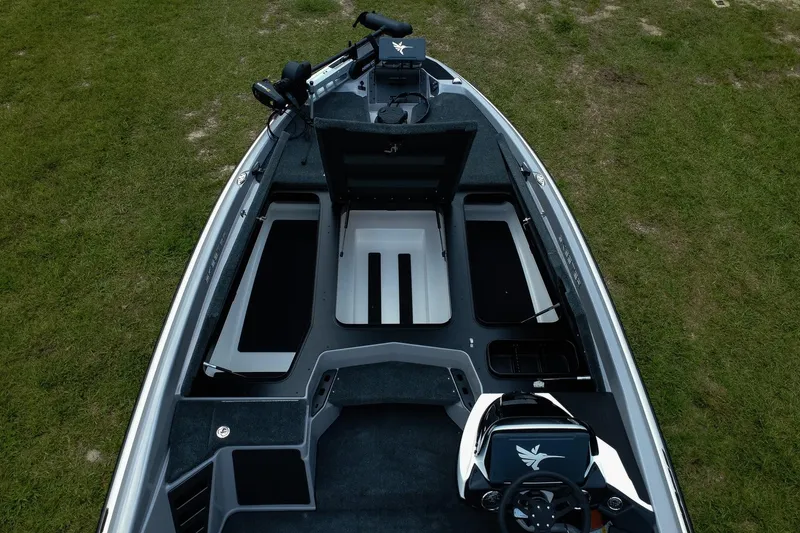 Slide: The Image of 2026 Skeeter ZXR20 SE boat interior with advanced controls and spacious storage compartments. - 6