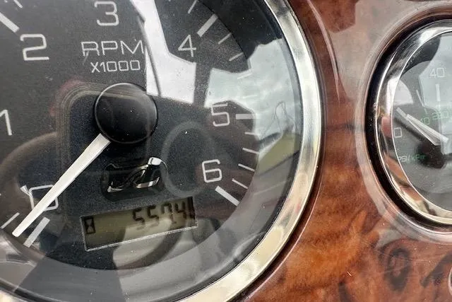 Slide: The Image of Close-up of 2002 Sea Ray 225 Weekender RPM gauge displaying 5504 hours. - 18