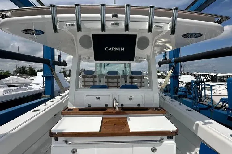 Slide: The Image of 2025 HCB 42 Lujo boat with Garmin display, featuring sleek design and modern amenities. - 4
