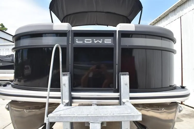 Slide: The Image of Interior of 2026 Lowe LS 190 boat with gray seating and flooring. - 12