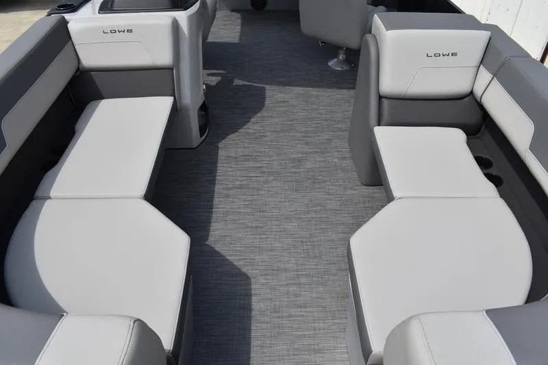 Slide: The Image of 2026 Lowe LS 190 boat interior with sleek gray seating and modern design. - 13