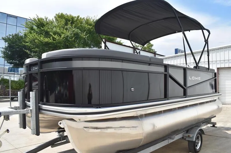 Slide: The Image of 2026 Lowe LS 190 boat seat with logo, featuring sleek gray upholstery design. - 15