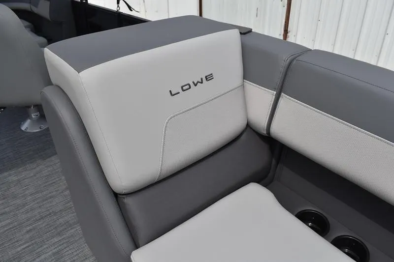 Slide: The Image of 2026 Lowe LS 190 boat seating with gray and white upholstery, featuring a modern design. - 21