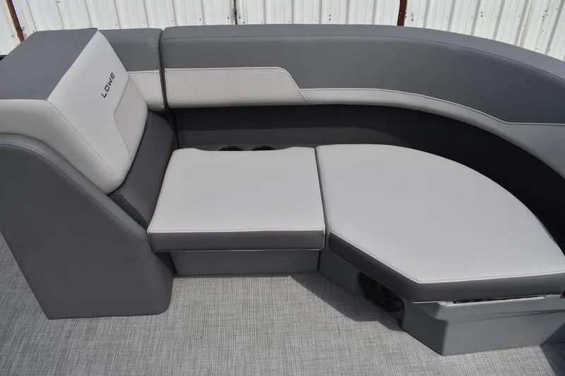 Slide: The Image of Lowe LS 190 (2026) boat seat storage compartment, gray upholstery, open lid. - 23