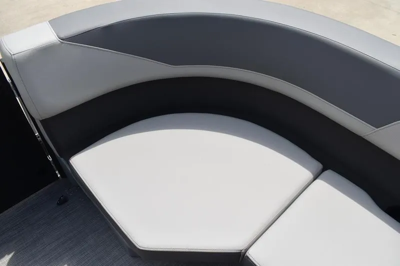 Slide: The Image of 2026 Lowe LS 190 boat seat with gray upholstery and integrated cup holders. - 24