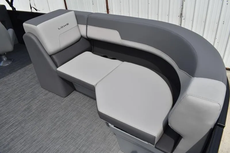 Slide: The Image of Luxurious seating on 2026 Lowe LS 190 boat, featuring sleek gray upholstery. - 26