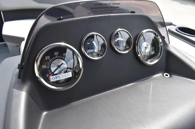 Slide: The Image of 2026 Lowe LS 190 boat interior with gray seating and modern dashboard design. - 28