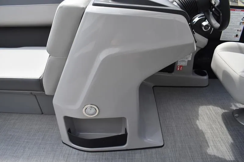 Slide: The Image of 2026 Lowe LS 190 boat interior with steering console and cushioned seat. - 31