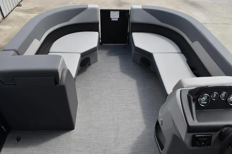 Slide: The Image of Interior of 2026 Lowe LS 190 boat, featuring sleek gray console and seating. - 32