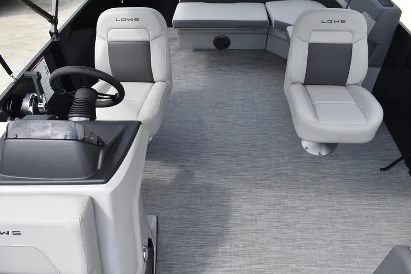 Slide: The Image of Steering console of 2026 Lowe LS 190 boat with gauges and controls. - 34