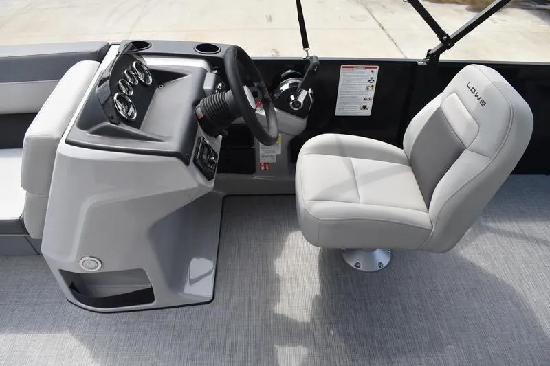 Slide: The Image of Steering column of 2026 Lowe LS 190 boat, featuring a flexible black boot. - 35