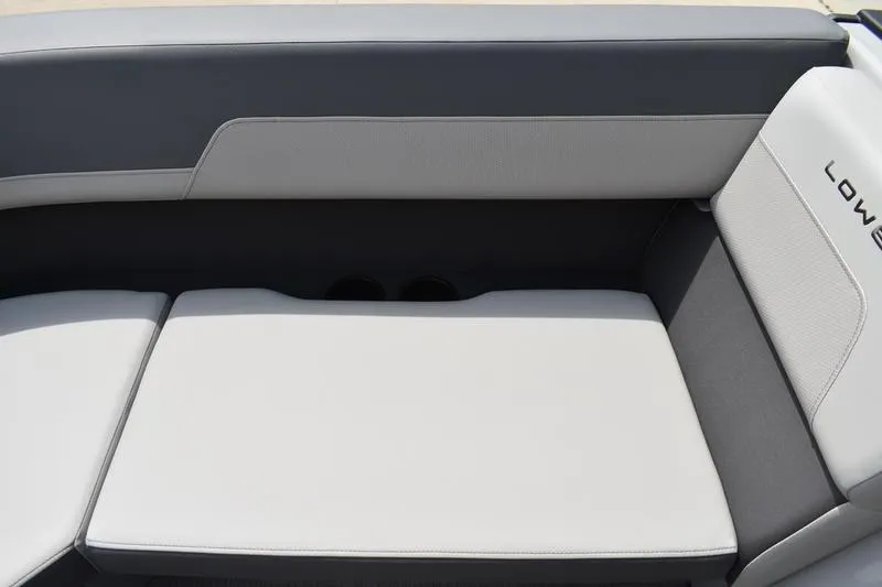 Slide: The Image of 2026 Lowe LS 190 pontoon boat with Mercury outboard motor on a trailer. - 9