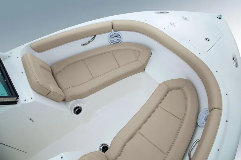 Slide: The Image of Manufacturer Provided Image: 2016 Pursuit DC 265 Dual Console boat interior with beige seating. - 34