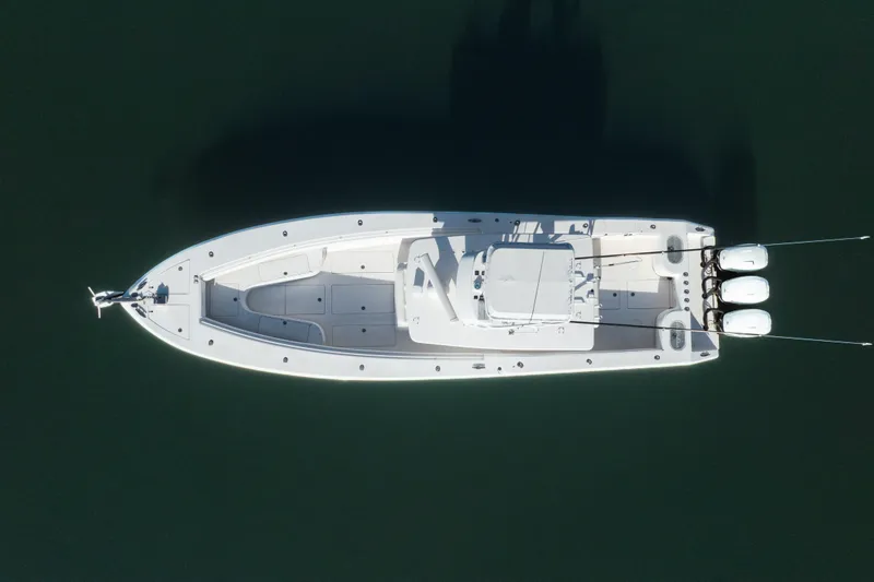 Slide: The Image of Overhead view of 2009 SeaHunter 40 boat with triple outboard engines. - 3
