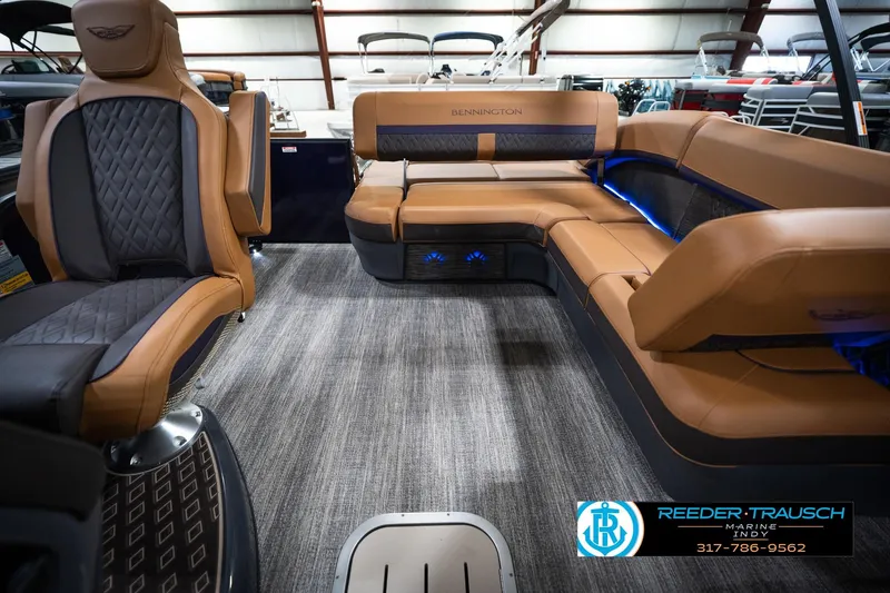 Slide: The Image of Luxurious interior of 2026 Bennington 22 MSB pontoon boat with plush seating and modern design. - 15