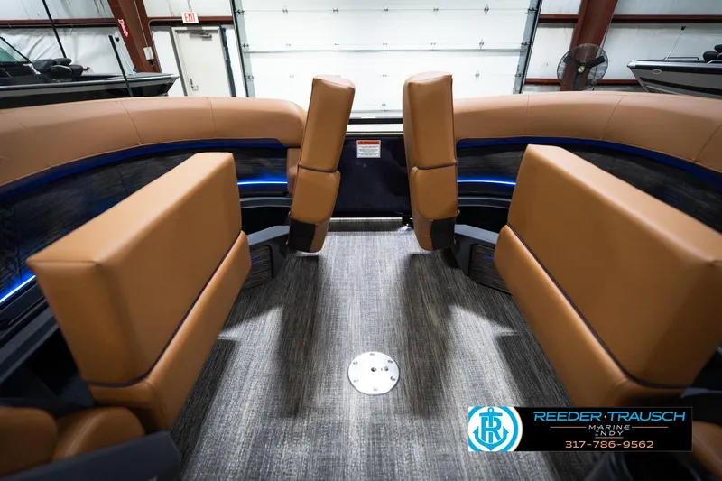 Slide: The Image of 2026 Bennington 22 MSB boat interior with tan seating and modern design. - 21