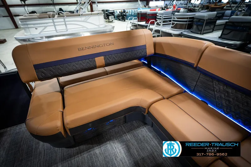 Slide: The Image of Luxurious seating on 2026 Bennington 22 MSB pontoon boat with ambient lighting. - 26