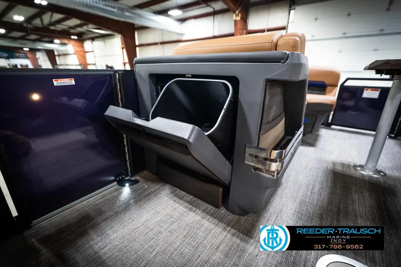 Slide: The Image of 2026 Bennington 22 MSB boat interior with modern seating and storage features. - 31