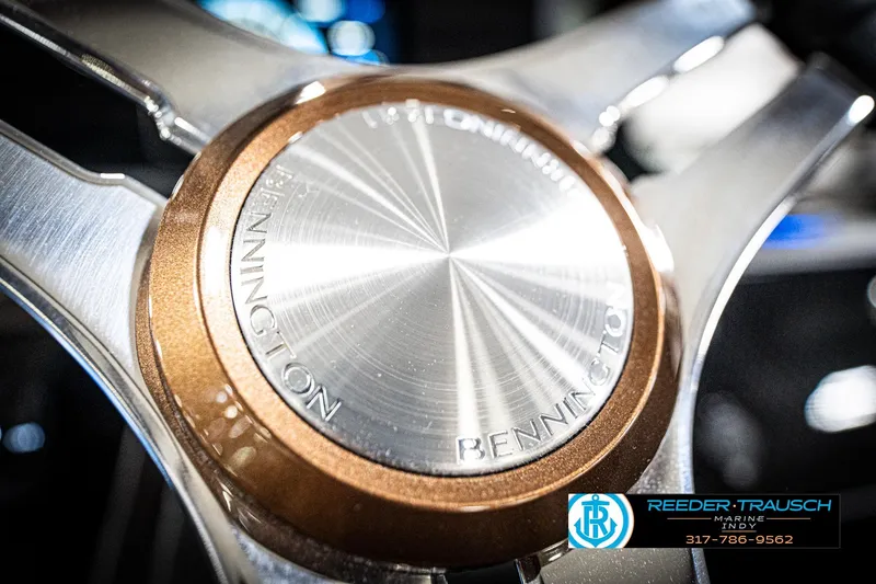 Slide: The Image of Close-up of 2026 Bennington 22 MSB steering wheel with Reeder-Trausch Marine logo. - 35