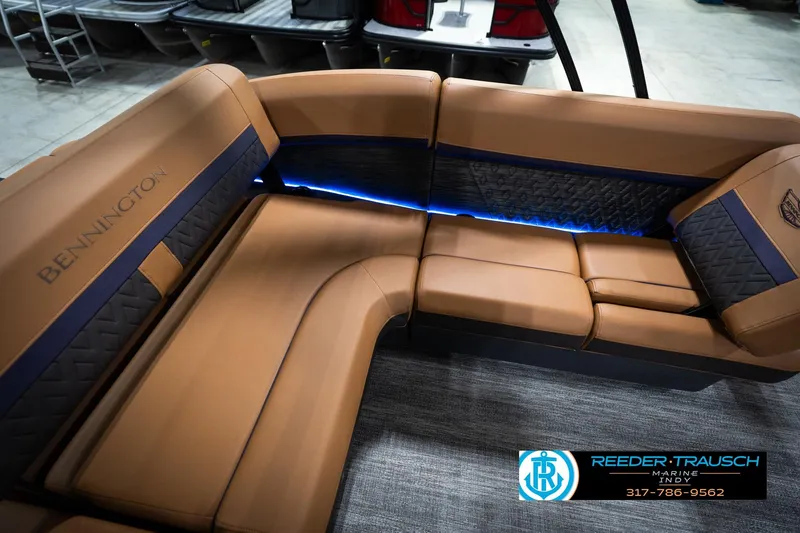 Slide: The Image of Luxurious seating on 2026 Bennington 22 MSB pontoon boat with elegant brown upholstery. - 45