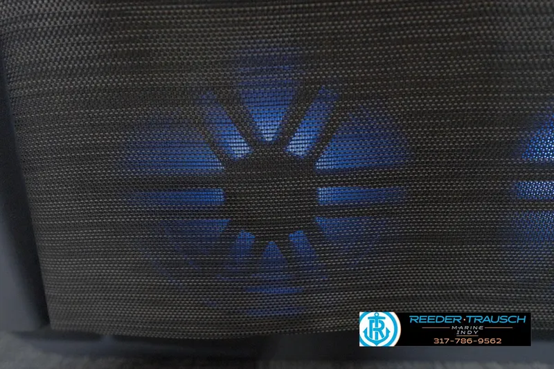 Slide: The Image of 2026 Bennington 22 MSB speaker with blue LED lighting, Reeder-Trausch Marine logo visible. - 48