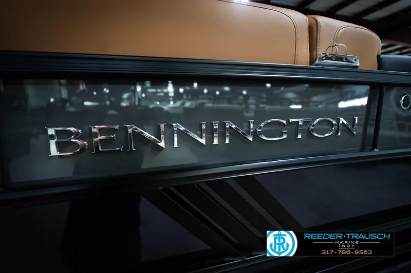 Slide: The Image of 2026 Bennington 22 MSB boat with sleek design and logo detail. - 52