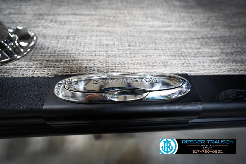 Slide: The Image of Close-up of 2026 Bennington 22 MSB boat detail with Reeder-Trausch Marine logo. - 55