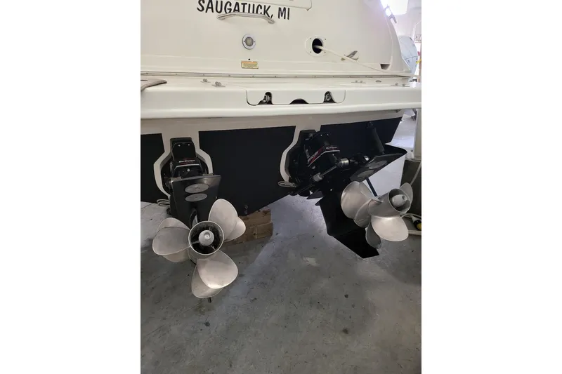 Slide: The Image of Rear view of 2001 Sea Ray 310 Sundancer boat with dual propellers in Saugatuck, MI. - 59