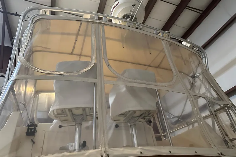 Slide: The Image of 1989 Egg Harbor 37 Convertible boat with enclosed flybridge and seating. - 4