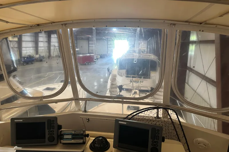 Slide: The Image of Interior view of 1989 Egg Harbor 37 Convertible yacht in a storage facility. - 41