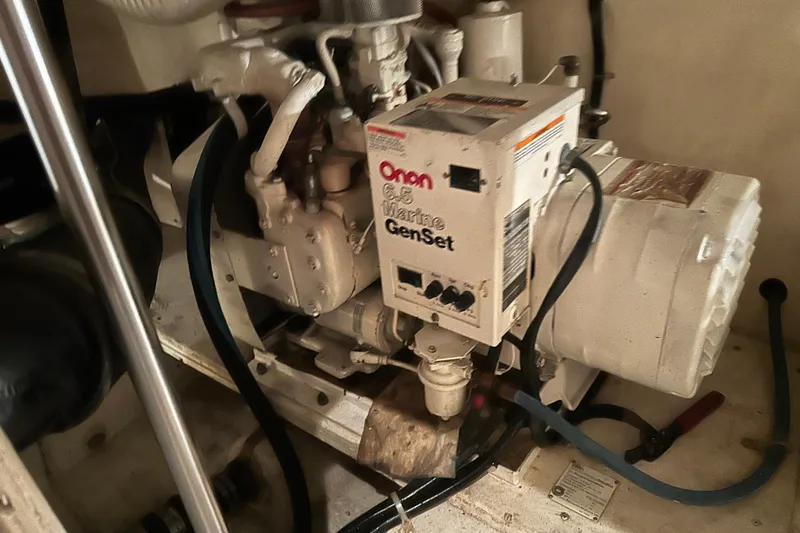 Slide: The Image of Engine room of 1989 Egg Harbor 37 Convertible with Onan Marine GenSet. - 51