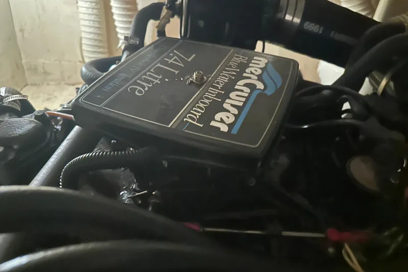 Slide: The Image of Engine of 1989 Egg Harbor 37 Convertible with MerCruiser Blue Water Inboard. - 58