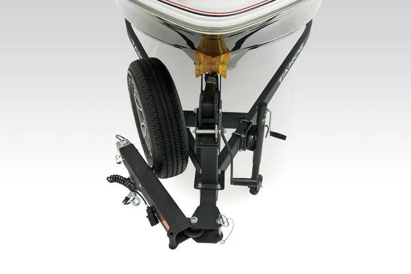 Slide: The Image of 2018 Tahoe 450 TS boat trailer with wheel and hitch detail. - 10