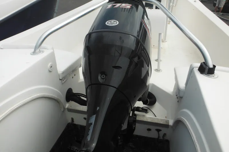 Slide: The Image of 2006 DC 23 DC Brown Custom CC boat with powerful outboard motor. - 41