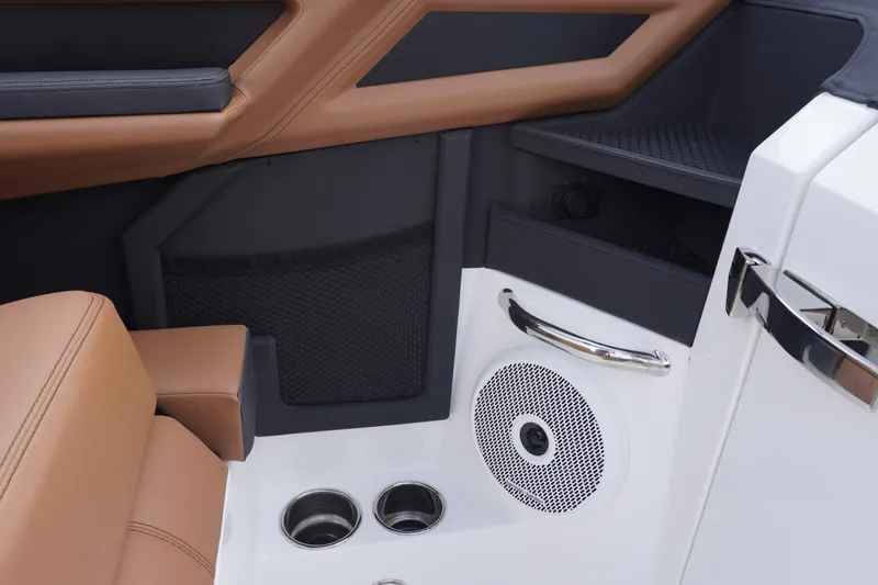 Slide: The Image of Interior of 2025 Cobalt R8 Surf boat with speaker and cup holders. - 17