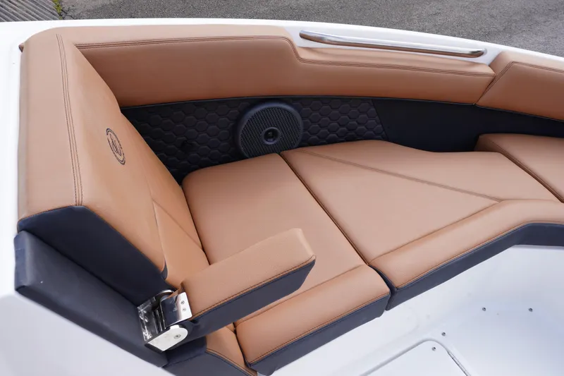 Slide: The Image of Luxurious tan seating in 2025 Cobalt R8 Surf boat, featuring sleek design and premium materials. - 18