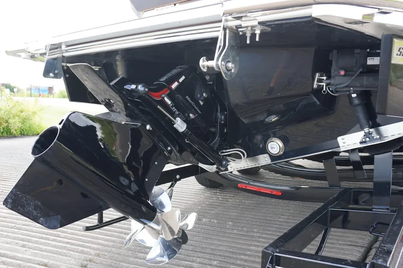 Slide: The Image of 2025 Cobalt R8 Surf boat's rear view showcasing propeller and engine details. - 5