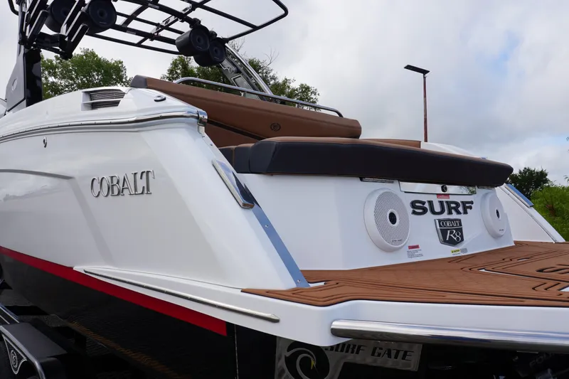 Slide: The Image of 2025 Cobalt R8 Surf boat with sleek design and premium features. - 6